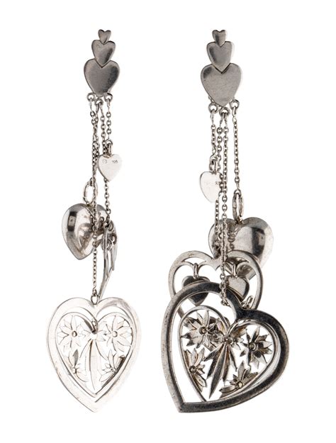 dior silver heart earrings|christian Dior earrings.